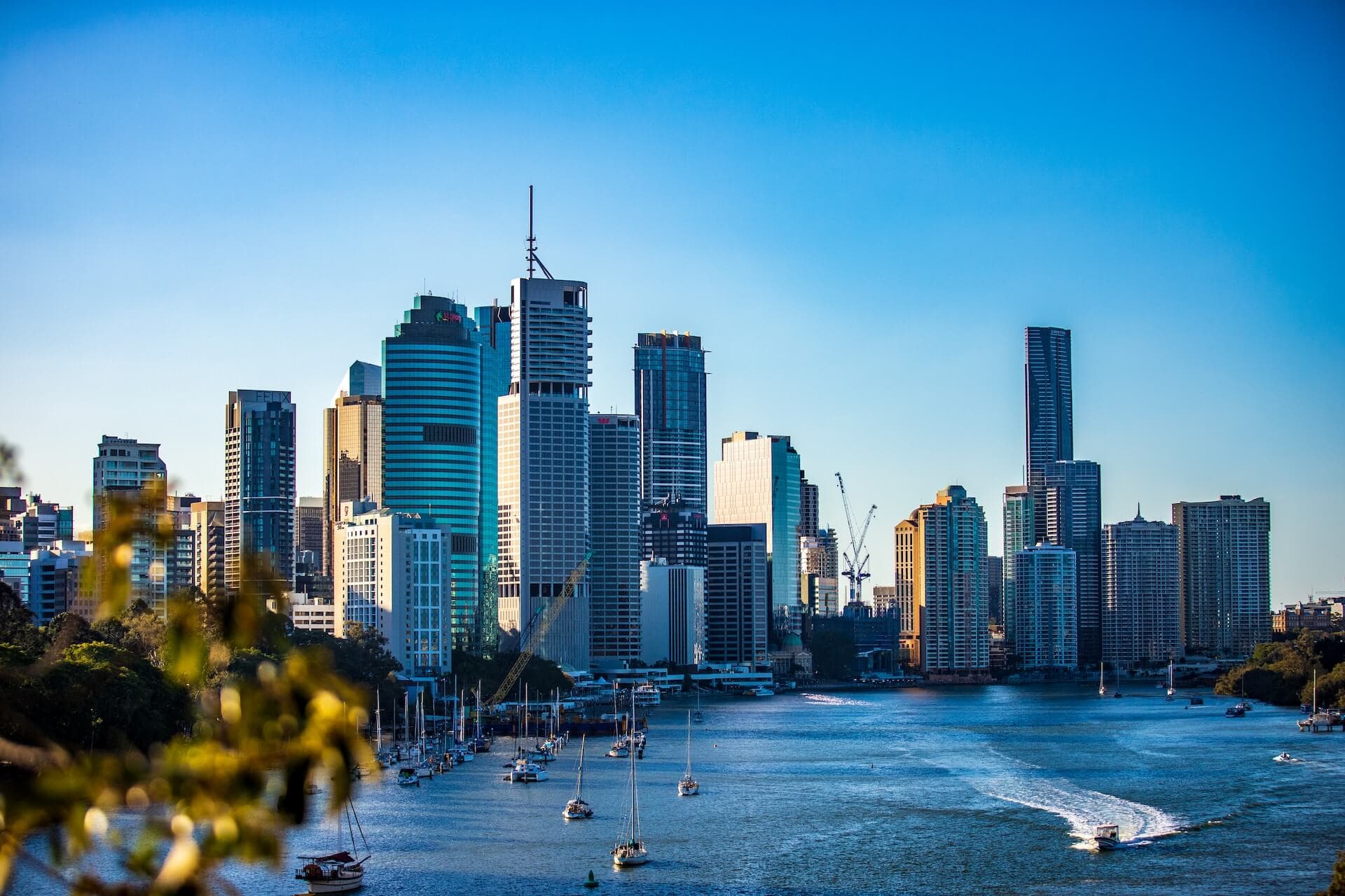 City skyline under clear blue sky during daytime
