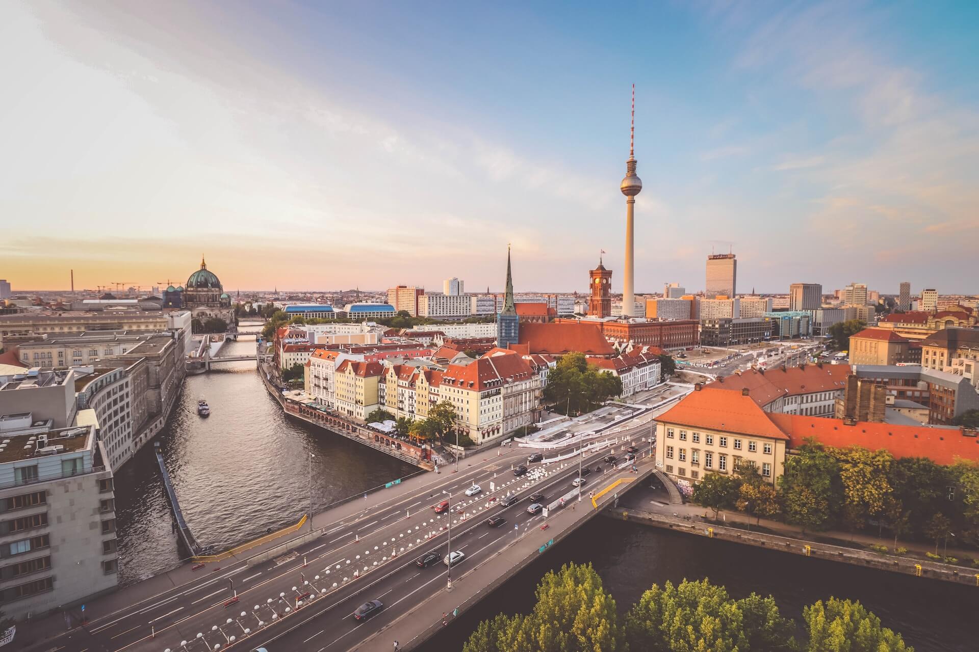 Berlin city buildings near body of water during daytime