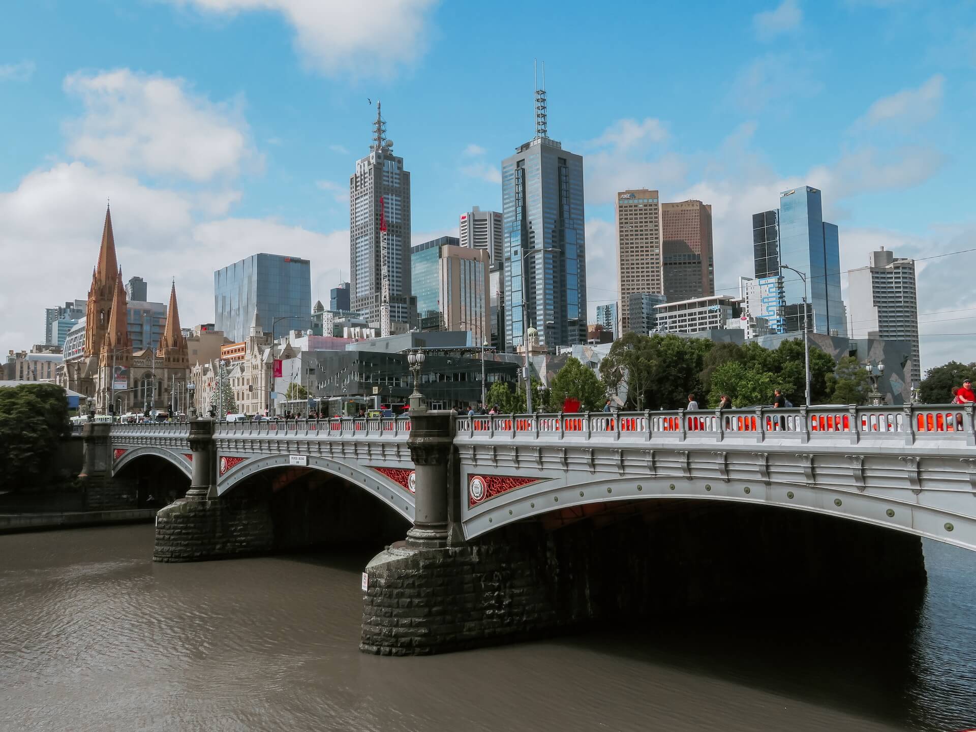 White bridge across city buildings